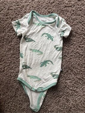 Kyte BABY White One-Piece with Green Alligator Print